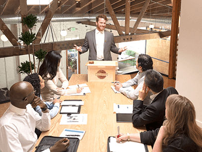 Man speaking to group of people